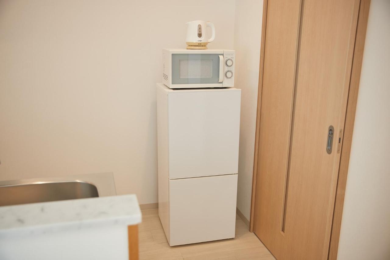 New Normal Hotel In Nago ニューノーマルホテルイン名護 المظهر الخارجي الصورة